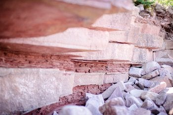 Variegated sandstone isn't the strongest or most preferable for building, but it's iconic on the peninsula's eastern shore. 