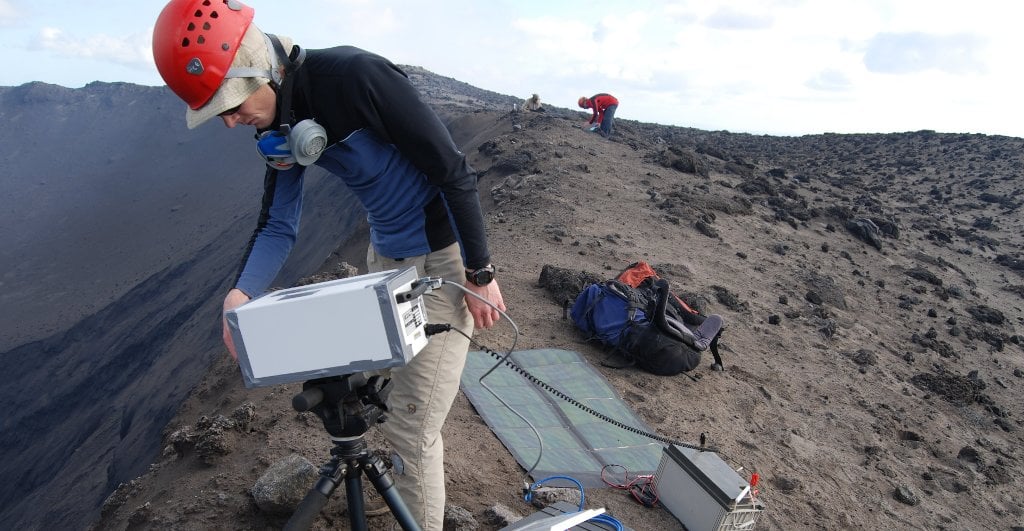 Simon Carn measures gas emissions from Mount Yasur in the island nation of Vanuatu in 2014. Image Credit: Simon Carn