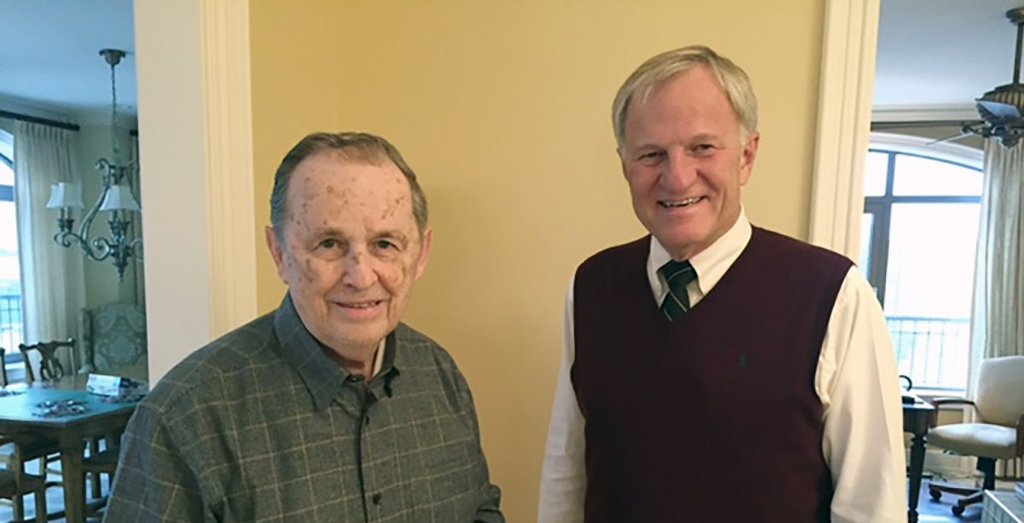 John Opie, left, poses with Michigan Tech President Glenn Mroz after receiving the Melvin Calvin Medal of Distinction.