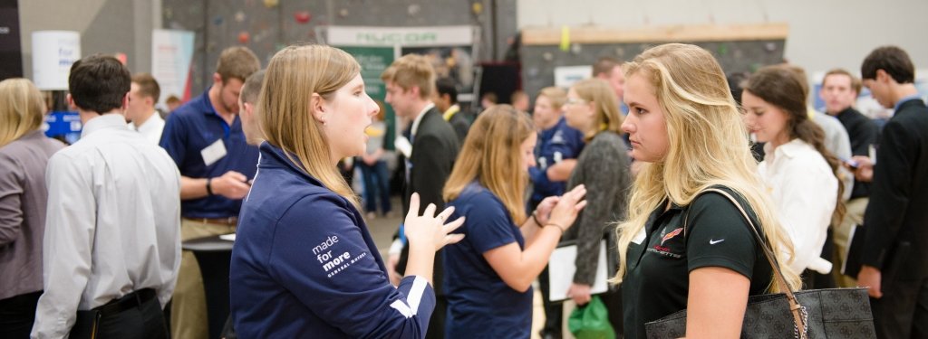 Student talking to a recruiter at Career Fair.