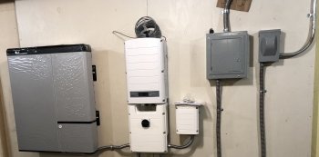 control box with inverter for solar system on a wall