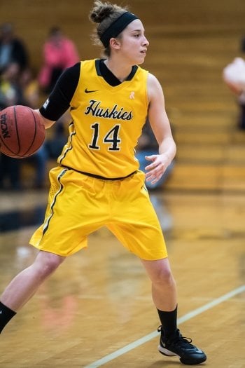 Michigan Tech women's basketball player on the court.