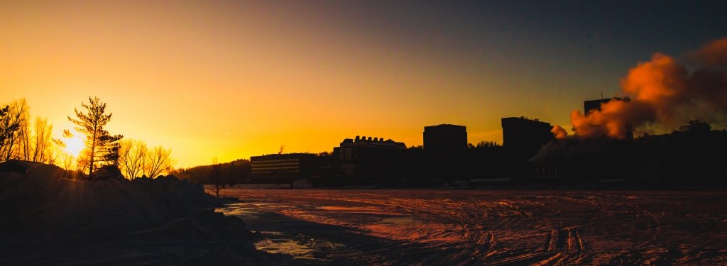 Sunrise over Michigan Tech campus in silouhette