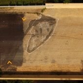 aerial image of bridge deck with white outlines around an eroded area