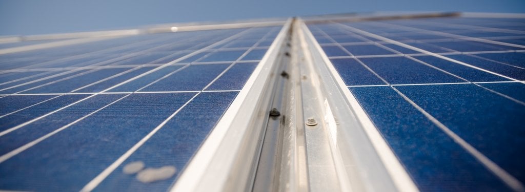 Looking up toward solar panels.