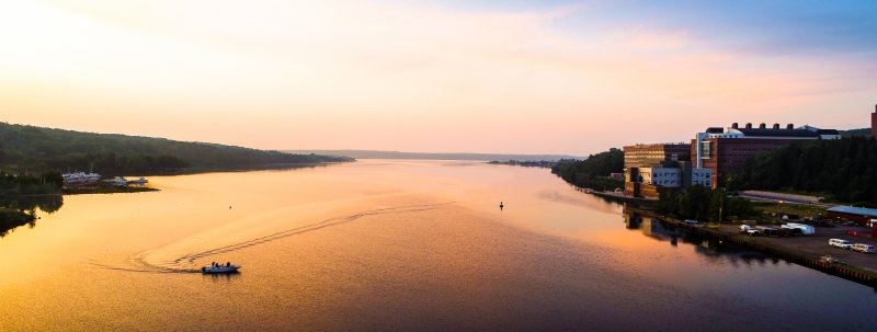 An aerial view of the Portage Canal at sunrise.