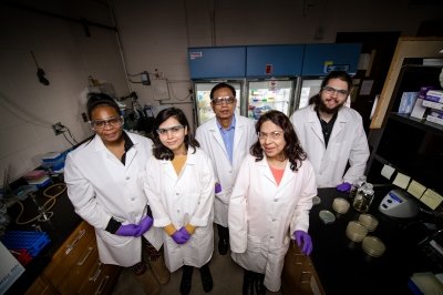 group of people in lab coats