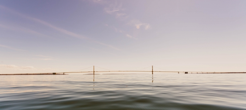 The Mackinac Bridge over the waters of the Straits of Mackinac.