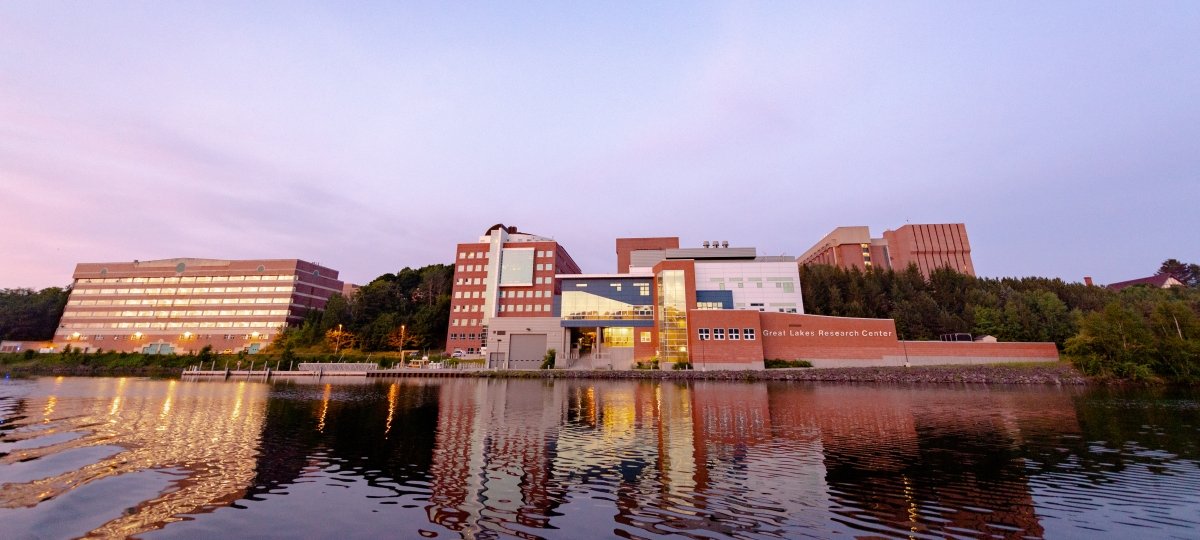 Shore view of the Michigan Tech campus at dusk