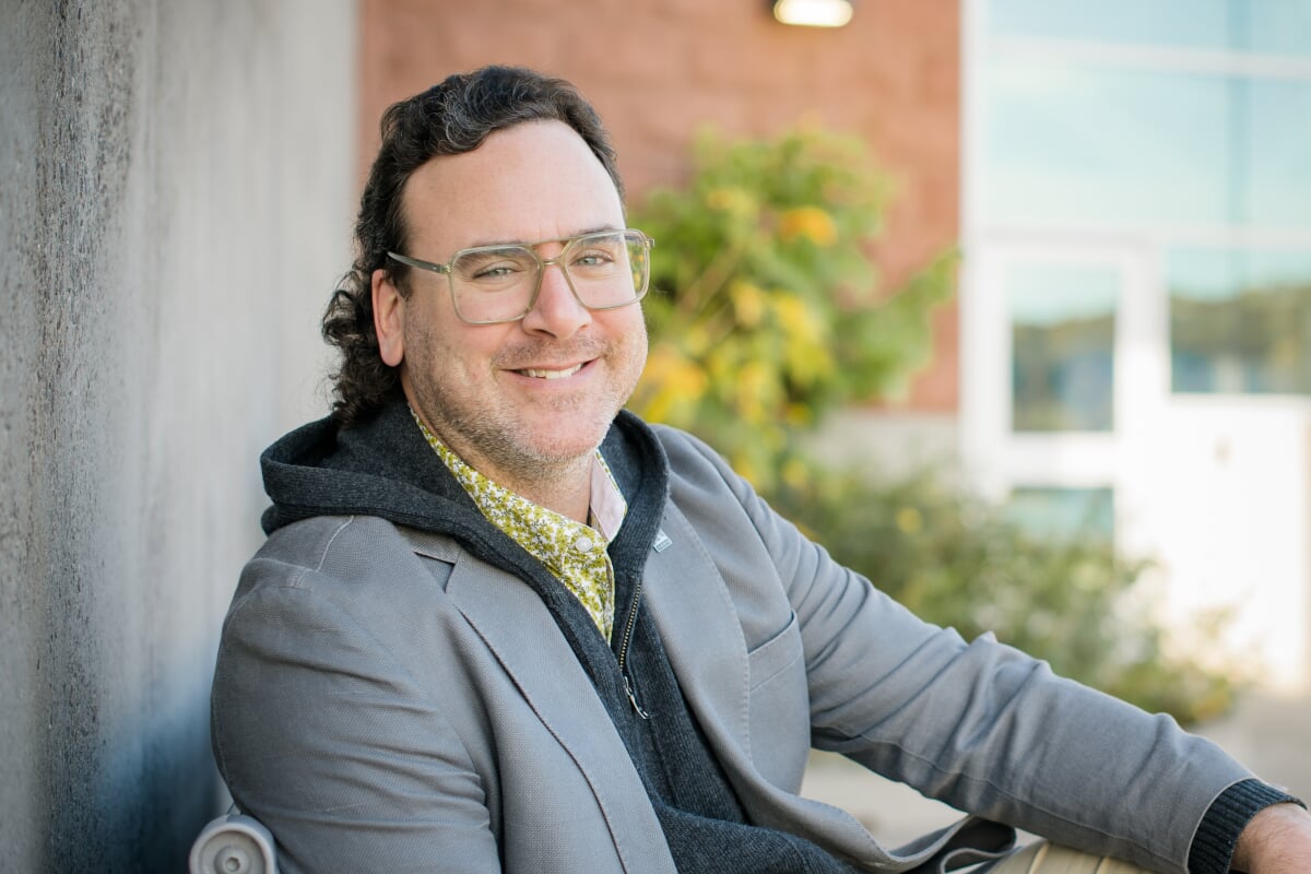 Timothy Havens sits outside the GLRC