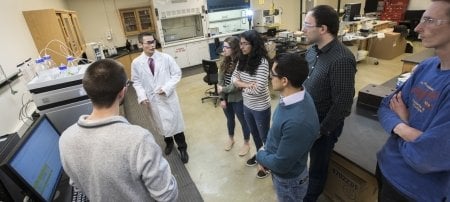 Daisuke Minakata with students in his lab. Minakata's research interests include developing computational tools for water and wastewater treatment technologies.