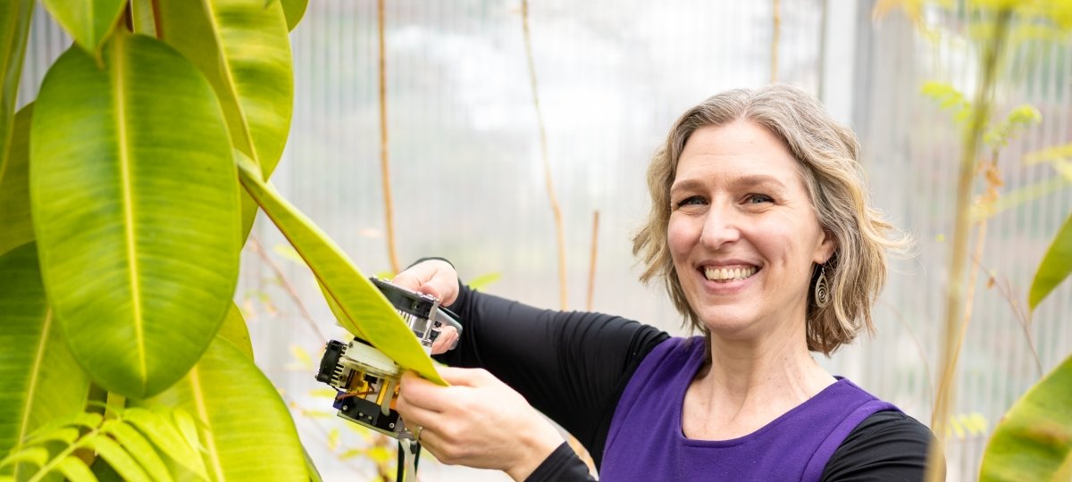 Molly Cavaleri in tropical greenhouse