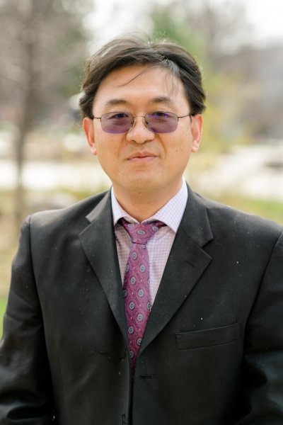 Award-winning researcher Jingfeng Jiang in an outdoor campus portrait.