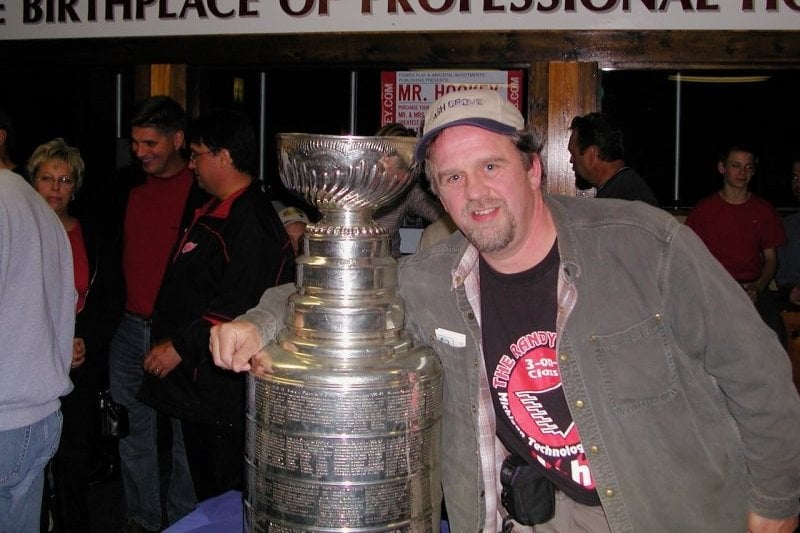 Larry Sutter wants to see every NHL team play in their home rink. But he didn’t have to travel far to see the Stanley Cup —alum Randy McKay brought it to Michigan Tech. Larry Sutter in the Michigan Tech SDC with the Stanley Cup.