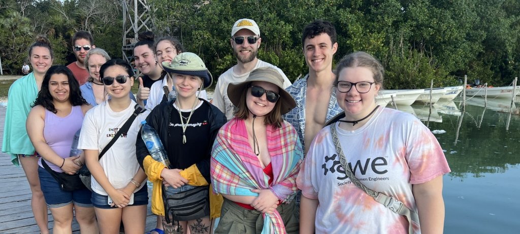Eleven Michigan Tech students led by faculty from the social sciences department spent their spring break learning and discovering on Mexico's Yucatan Peninsula. (Images courtesy Michigan Tech Social Sciences Study Abroad Program) Twelve young people from Michigan Tech smile on a dock with water and small boats behind them as they study abroad in the Yucatan Peninsula.