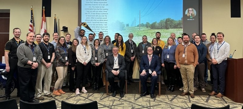 Jon Jipping with ITC employees who are Michigan Tech alumni