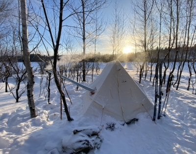A winter camping set-up on Isle Royale included a vented tent with heating.