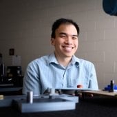 Vinh Nguyen, assistant professor of mechanical engineering-engineering mechanics and MTU Manufacturing Day coordinator in his lab.
