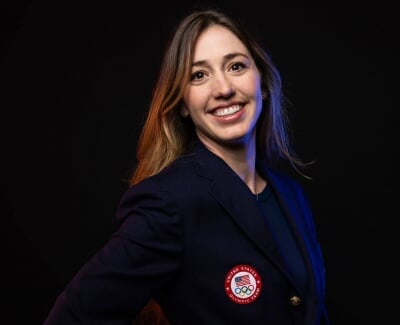 Deedra Irwin wearing her Olympic jacket.