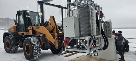 Researchers on the docks of Michigan Techâ€™s Great Lakes Research Center prepare to deploy Seatrecâ€™s Arctic Power Station, a novel thermal energy harvesting system designed for the Arctic environment. (Photo courtesy Travis White)