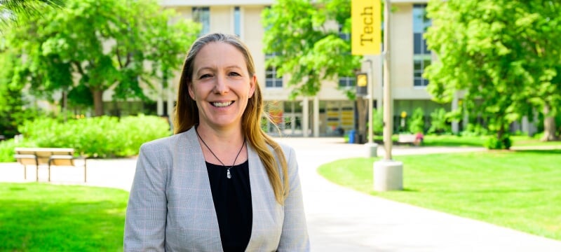 Adrienne Minerick standing outside on campus.