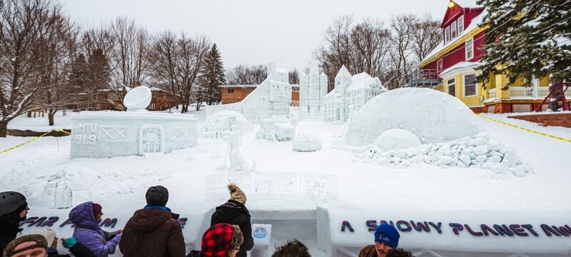 Spectators view Phi Kappa Tau's month-long statue "Keweenaw in Another Universe"