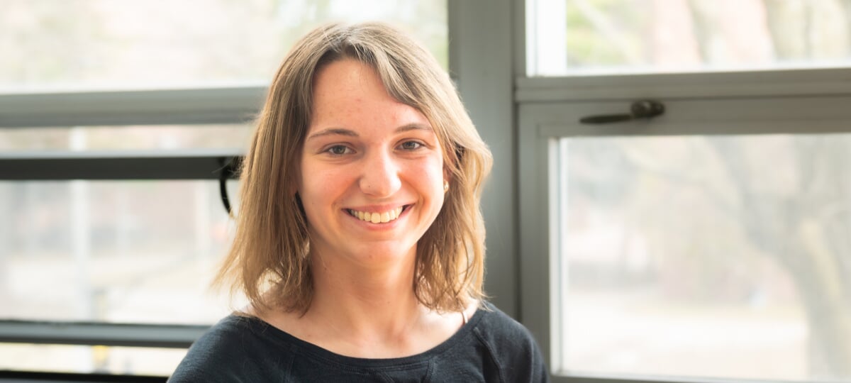 Aili Toyli combined her statistics talent with a passion for medical research during her time at Tech, opening new lines of inquiry into connections between cardiovascular disease and Alzheimer’s. Aili Toyli in front of a window.