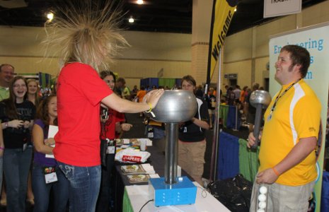 MindTrekkers-DestinImag_2011 Getting a charge out of a Van de Graaff generator.