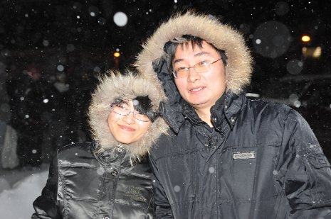 Two Michigan Tech students enjoying winter