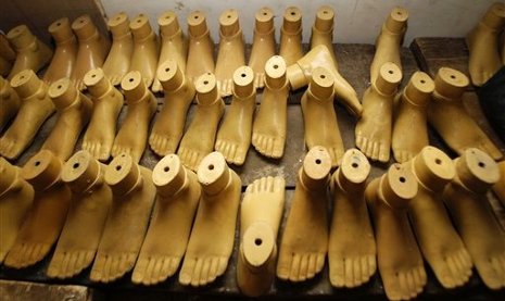 The Jaipur foot is an inexpensive prosthethic that Michigan Tech students are working to improve.   AP Photo