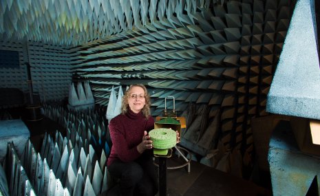 Elena Semouchkina tests ceramic resonators in the anechoic chamber in her lab.