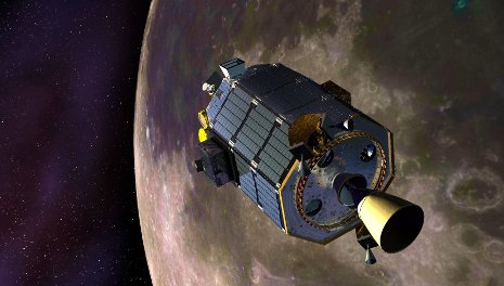 An artist's concept showing the Lunar Atmosphere and Dust Environment Explorer (LADEE) spacecraft is seen orbiting the moon as it prepares to fire its maneuvering thrusters to maintain a safe orbital altitude. Credit: NASA Ames / Dana Berry