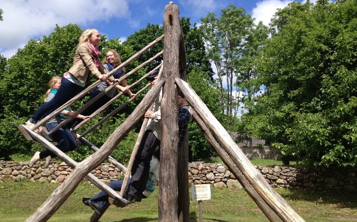Students try a traditional Estonian swing.