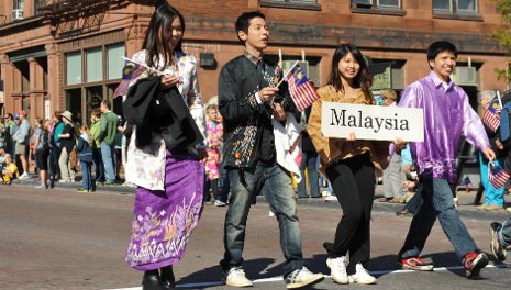 Malaysian students march in Parade of Nations.