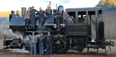 Steam locomotive lives again. Stathi Pappas and his wife, Miranda, left, and the rest of the fix-it gang.
