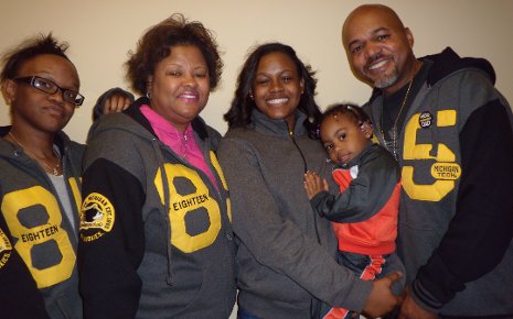Rebecca Spencer (center) with her mother and father, Chiquita and Joseph Spencer, and her sisters.