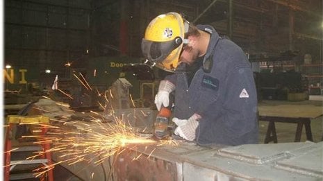 A Michigan Tech student intern working at Nucor.