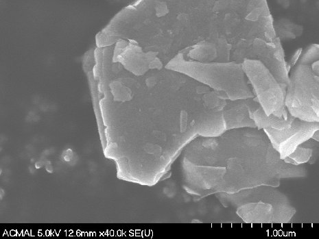 Microscopic view of molybdenum disulfide nanosheets, a material that flakes in thin, angular sheets.