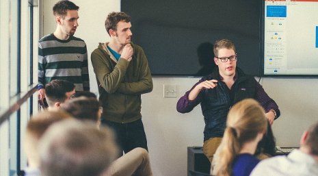 Handshake founders Scott Ringwelski, left, Ben Christensen, center, and Garrett Lord  explain their career networking app.