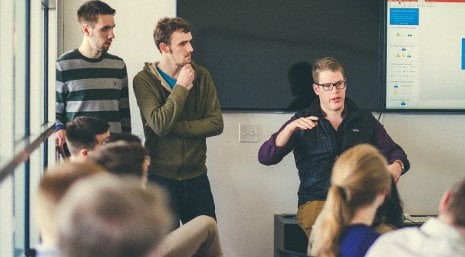 Handshake Team Handshake founders Scott Ringwelski, left, Ben Christensen, center, and Garrett Lord explain their career networking app.