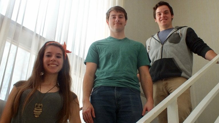 AEE Team - Sustainability House Tasks are divided and conquered at Sustainability House. From the left, Rose Turner works on the solar array design; Nathan Ackerman uses modeling software; and Mario Graziano focuses on community outreach.