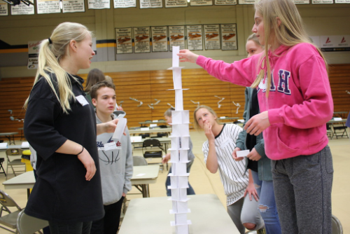 Students building a tower