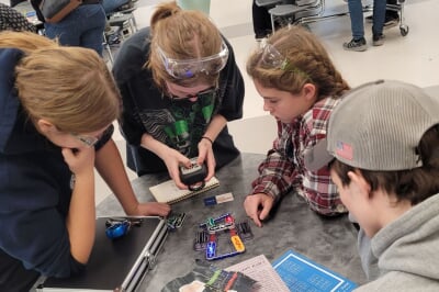 students doing unboxed