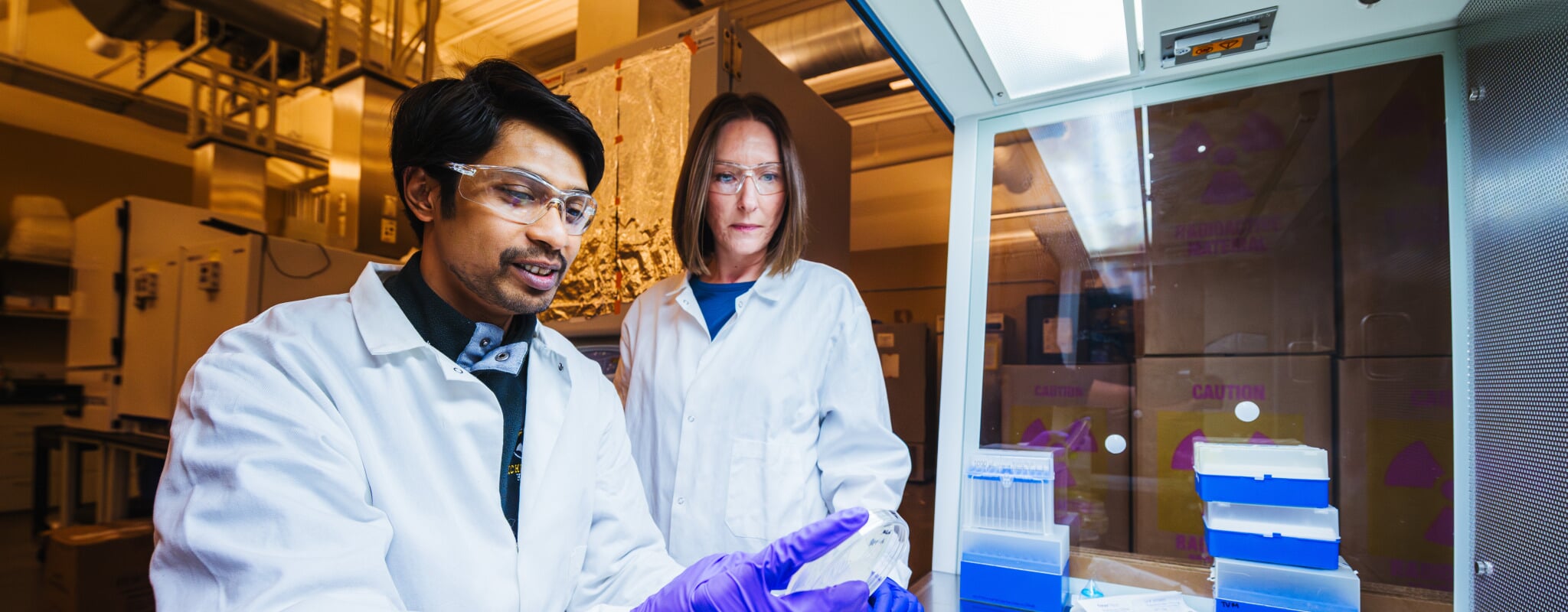 In Trista Vick-Majors' lab, she and KM Shafi, left, meticulously grow bacteria samples for testing.
