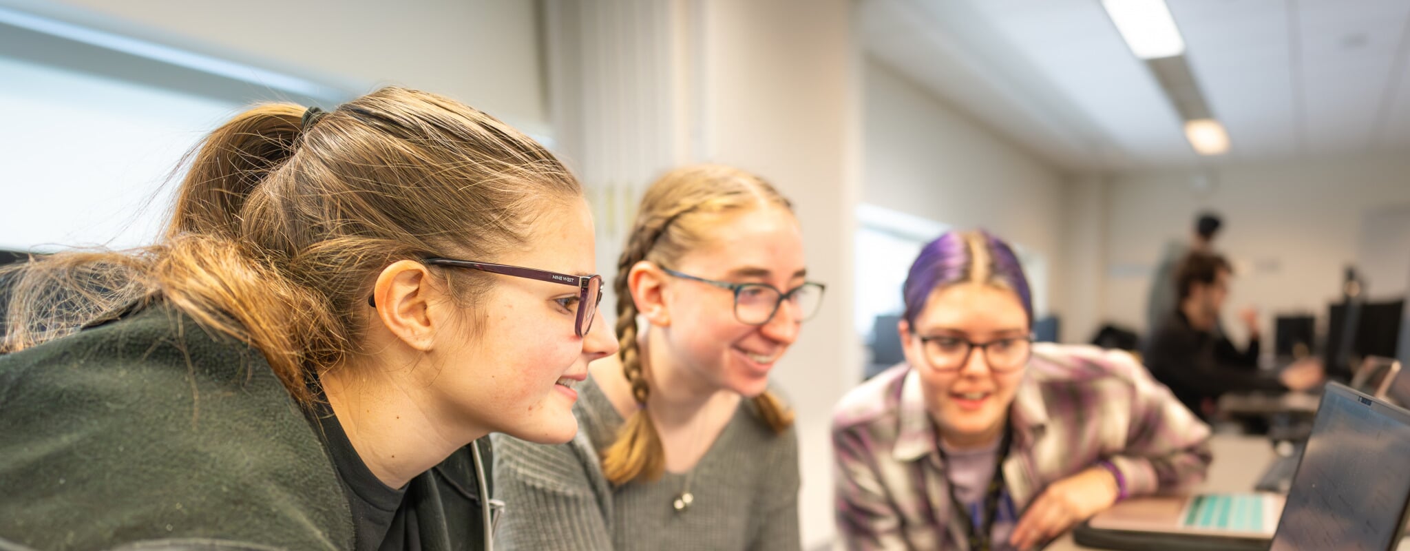 Data science students collaborating