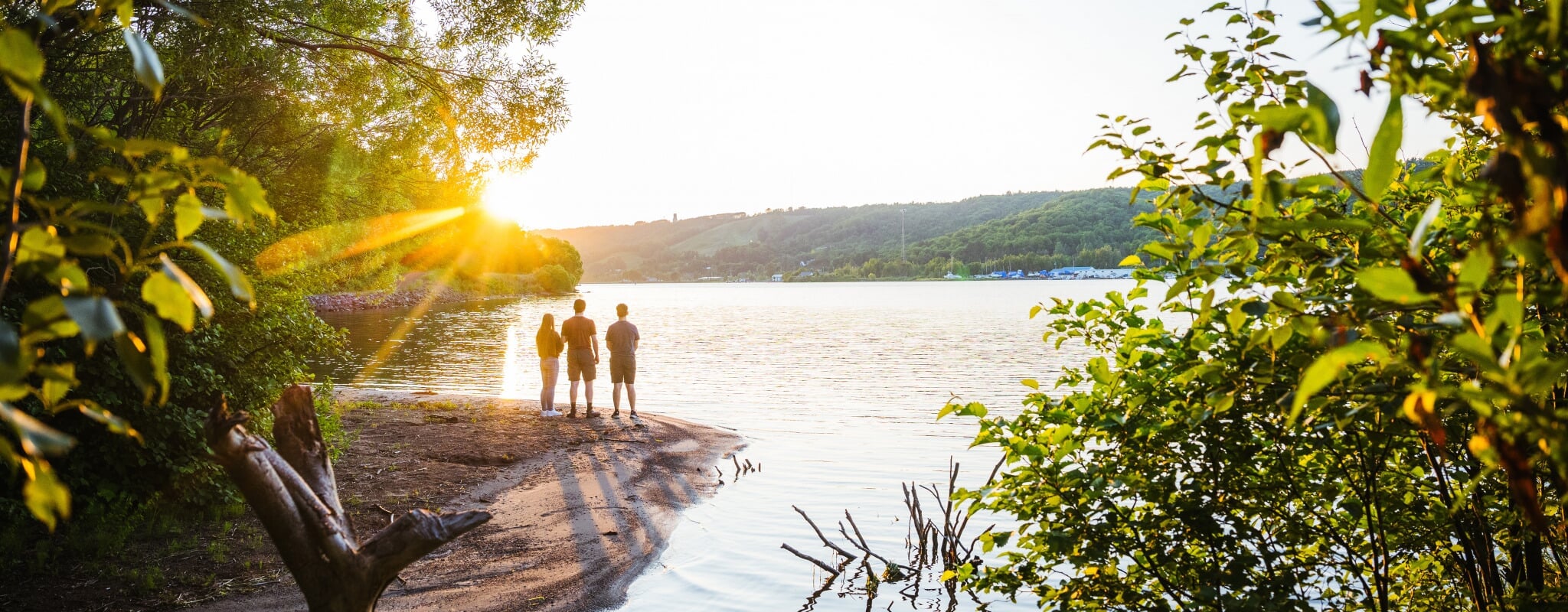 Students look out at the Keweenaw Waterway at Prince’s Point Campus Park