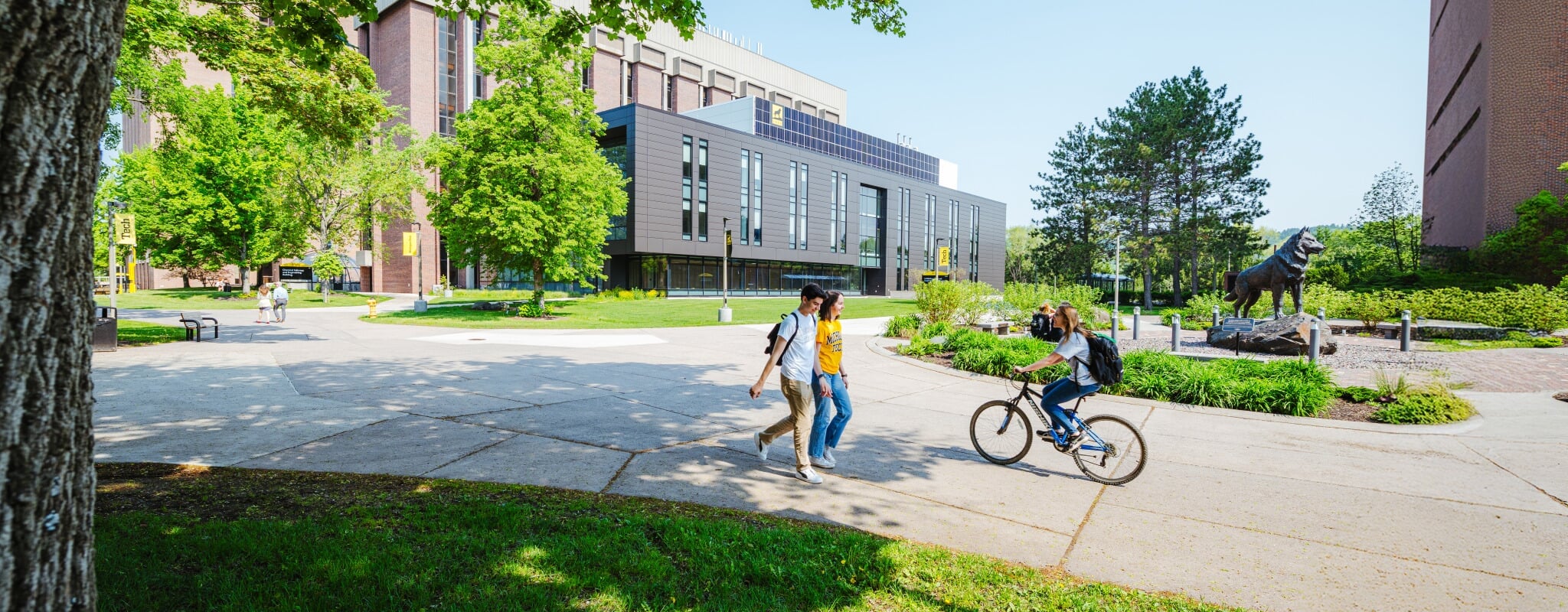 Students walking through the Husky Plaza