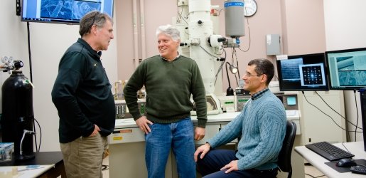 Faculty members in a Physics lab.