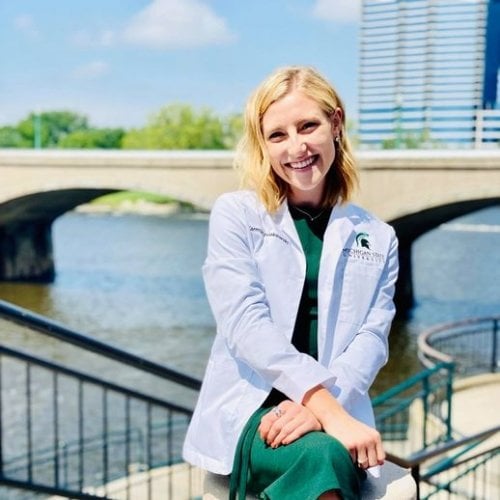 Image of Michigan Tech pre-med student Karmyn Polakowski sitting by a river