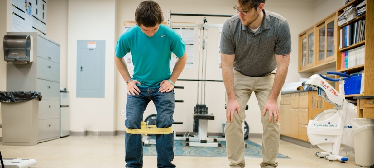 Image of student learning exercise with theraband